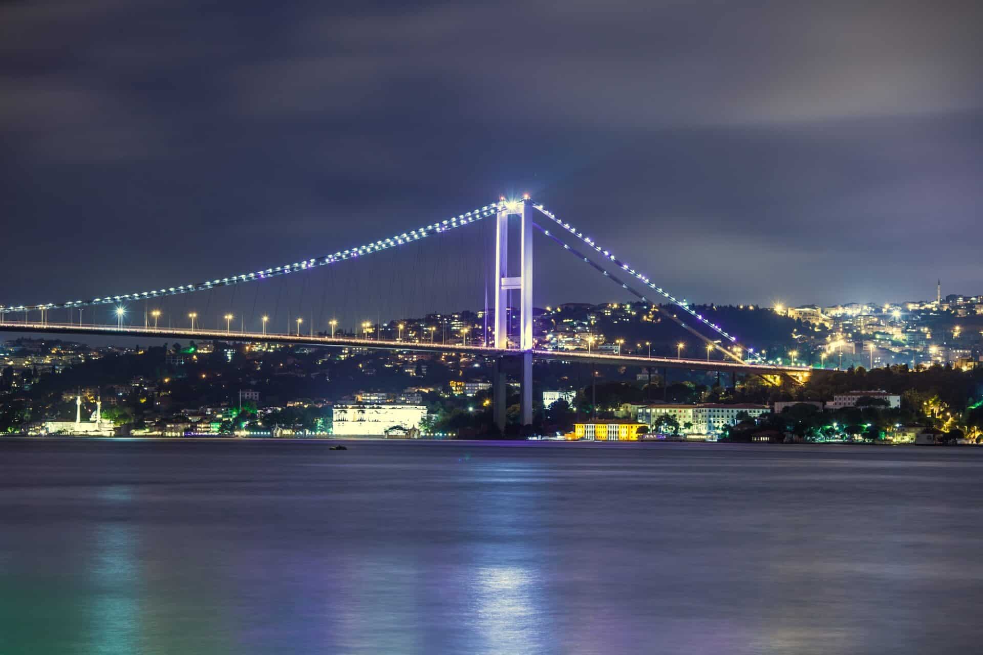 Bosphorus Bridge at night, Istanbul, Turkiye Citizenship