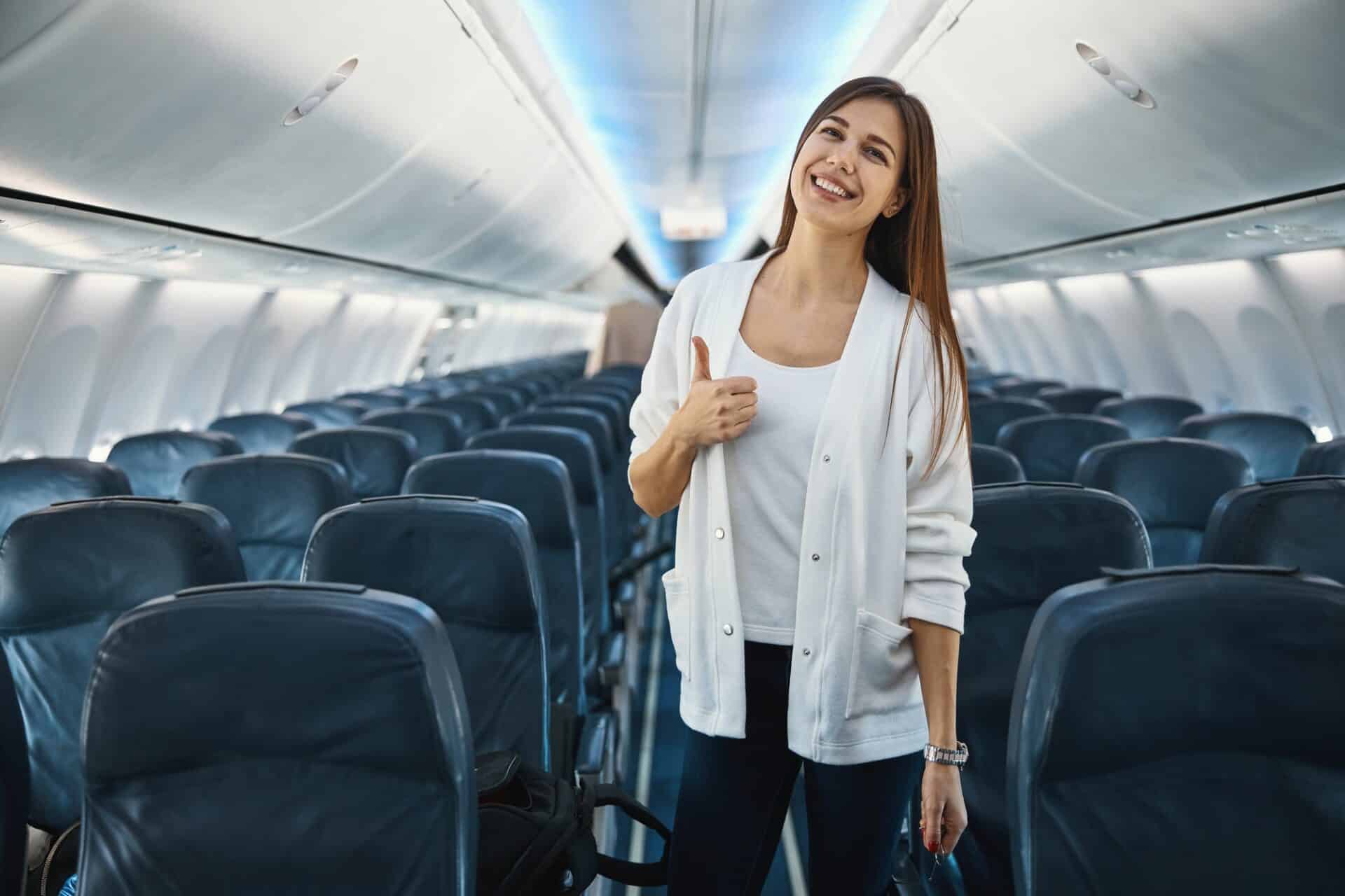 Female passenger feeling optimistic about the upcoming journey