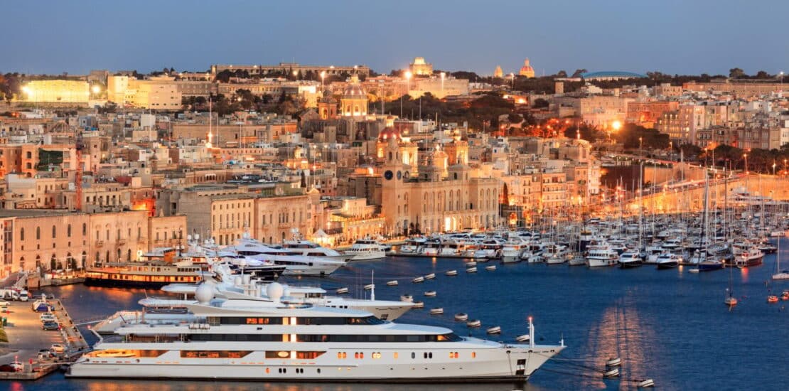 Valletta, Malta. View of Grand harbor from Upper Barrakka Gardens in the evening