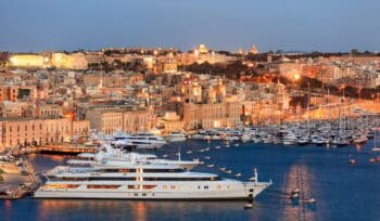 Valletta, Malta. View of Grand harbor from Upper Barrakka Gardens in the evening