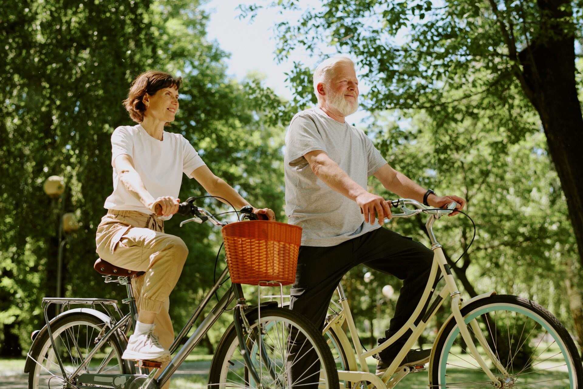 Happy Retired People Riding Bikes