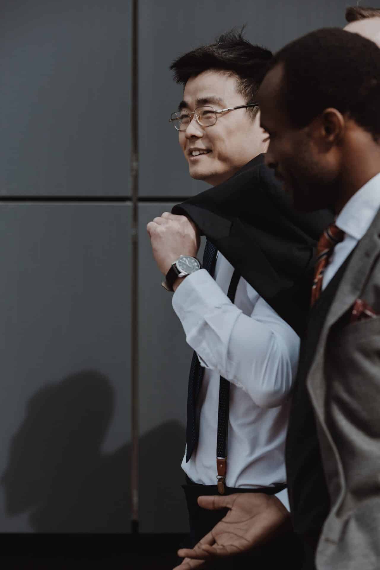happy stylish multicultural business team walking outdoors, business people team concept
