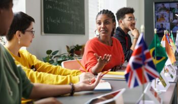 Multicultural Students Chatting in Class